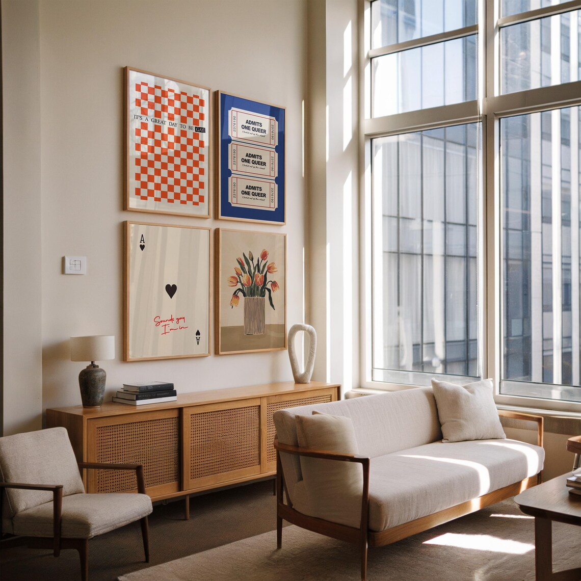 A set of framed wall art prints above a sofa